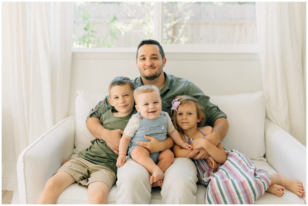 dad with kids on couch