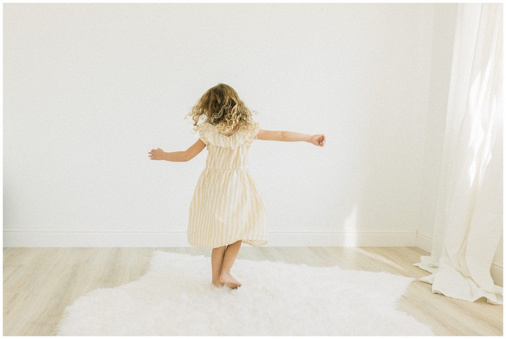 girl spinning in dress